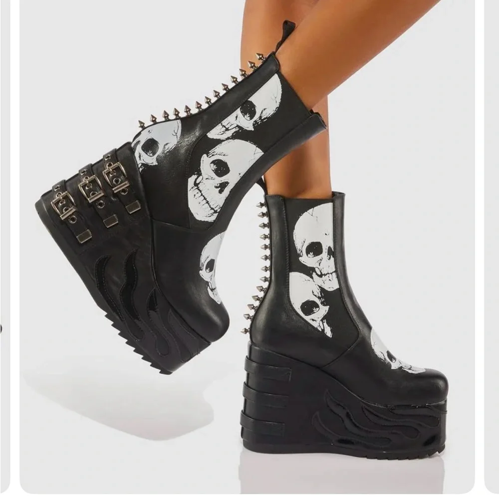 Edgy Black and White Platform Boots with Skull Motif